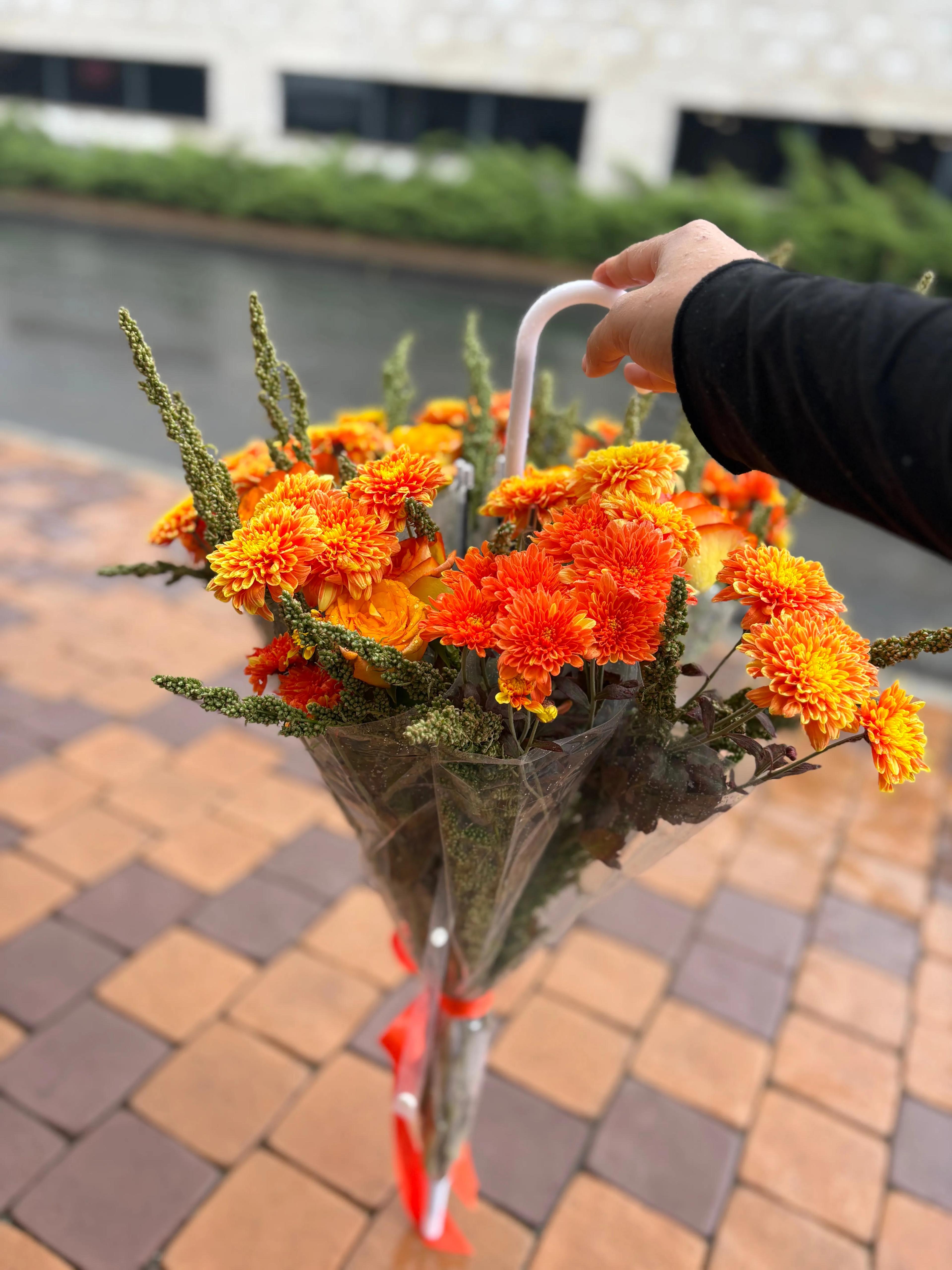 A bouquet of flowers in a raincoat | ծաղիկներ, ծաղկեպսակներ, բույսեր - առաքում Երևան A bouquet of flowers in a raincoat | ծաղիկներ, ծաղկեպսակներ, բույսեր - առաքում Երևան
